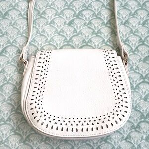 Faux-Leather Crossbody Bag. White with Detailed Design and Adjustable Strap.